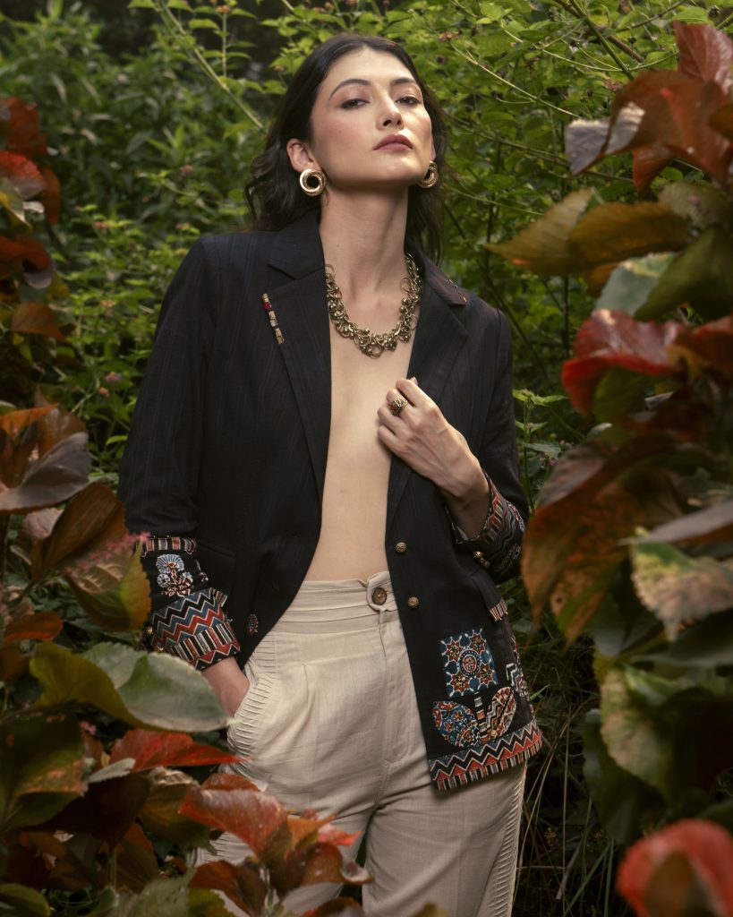 Black embroidered blazer campaign shoot at garden by sandeep vishwakarma