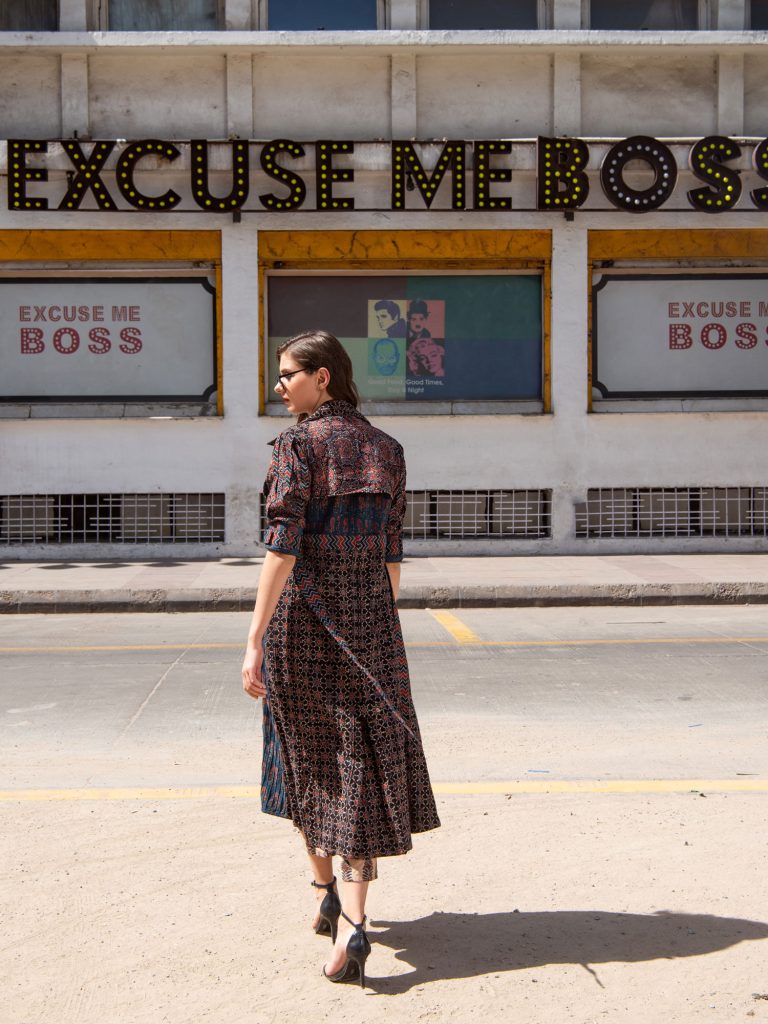 Patterned dress street fashion shoot against the excuse me boss by sandeep vishwakarma